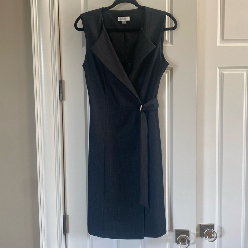 Calvin Klein Dress. Blue wrap with button and zipper. Size 8. New no tags.